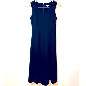 Calvin Klein Sleeveless black long dress size 4. Rhinestones on shoulders.